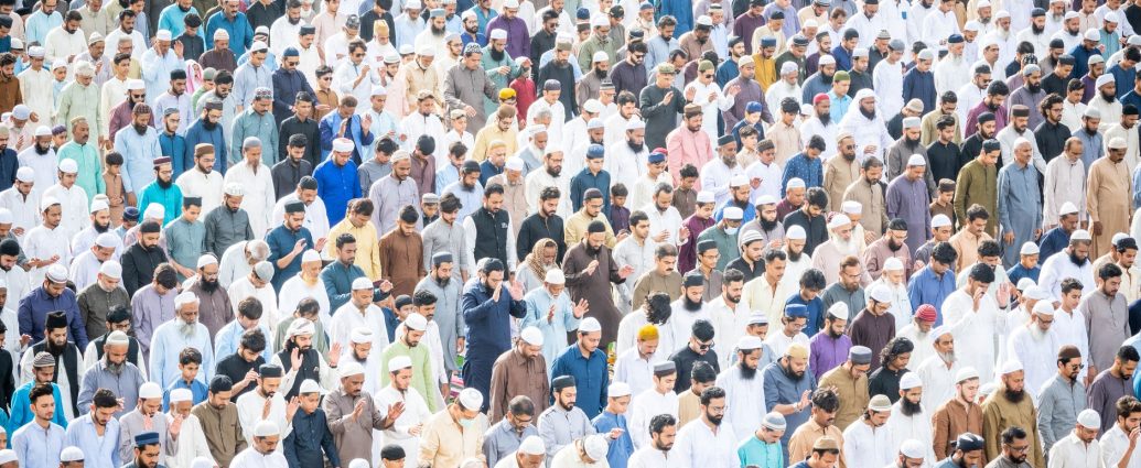 crowd of praying men