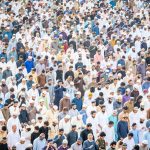 crowd of praying men