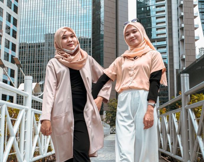 two women in beige hijabs