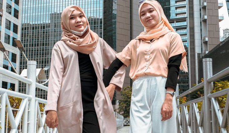two women in beige hijabs