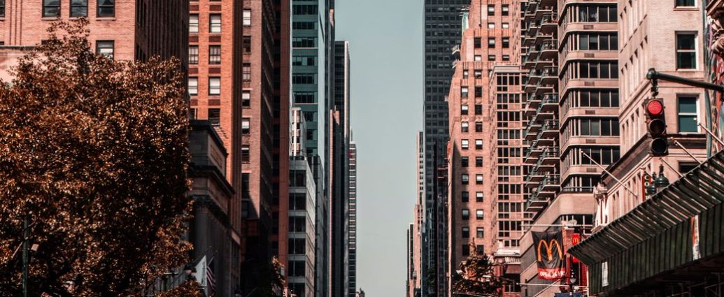 people walking near high rise buildings