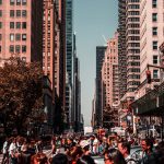 people walking near high rise buildings
