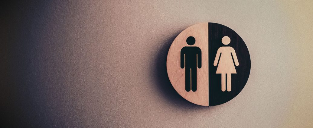male and female signage on wall