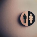 male and female signage on wall