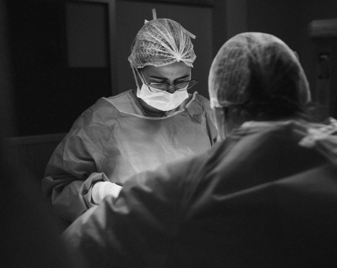 black and white operating room scene