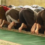 muslim worshippers in prayer at mosque