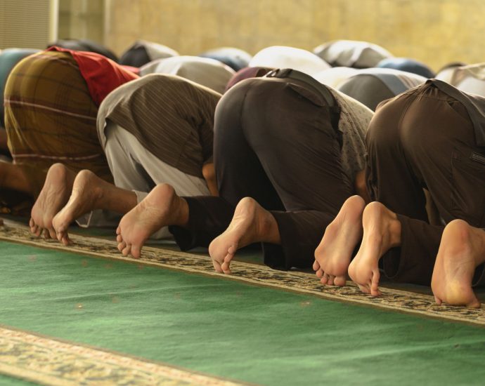 muslim worshippers in prayer at mosque
