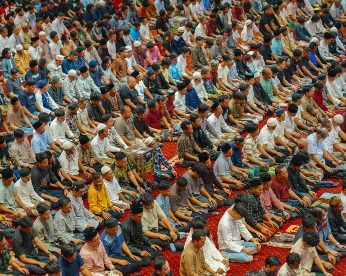 muslim congregation praying in jakarta mosque