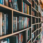 books on brown wooden shelves