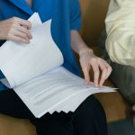 person looking at documents