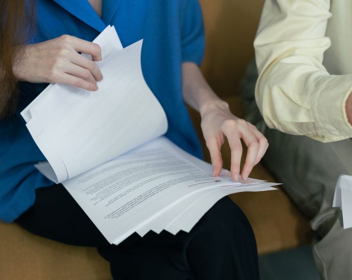 person looking at documents
